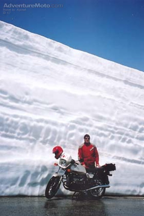 Col de L'Iseran, I'm 188 cm tall, so that makes this snow bank over 4 meters high. This photo was taken June 24th just down from the pass towards Mont Cenis.