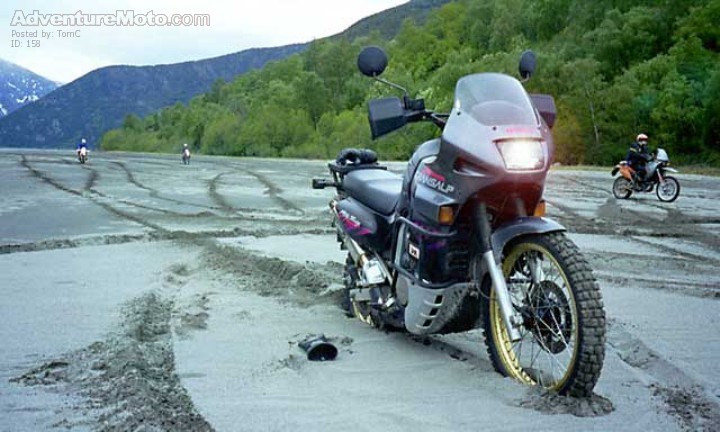 Transalp in sand - A short brake during a sandy session riding on a partially dry lake bottom. Transalp + sand = fun!