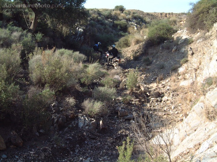 ...heading up a dried river has its problems.... - ..took us 2 hrs to cover 200 yards.you know you're cornered when you are dragging your bike up a slope.